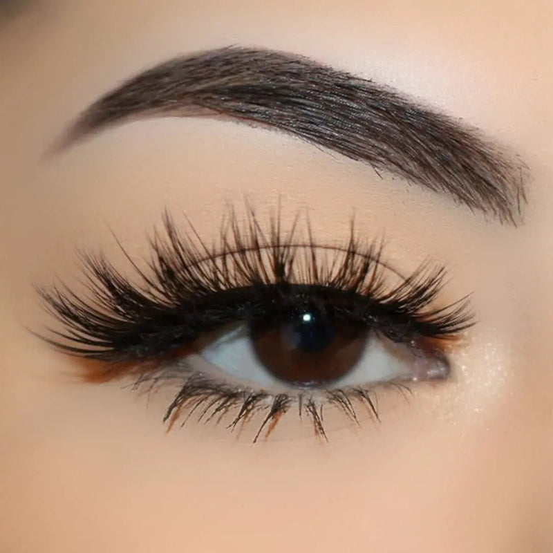 Close-up of an eye wearing Sinful wispy strip lashes