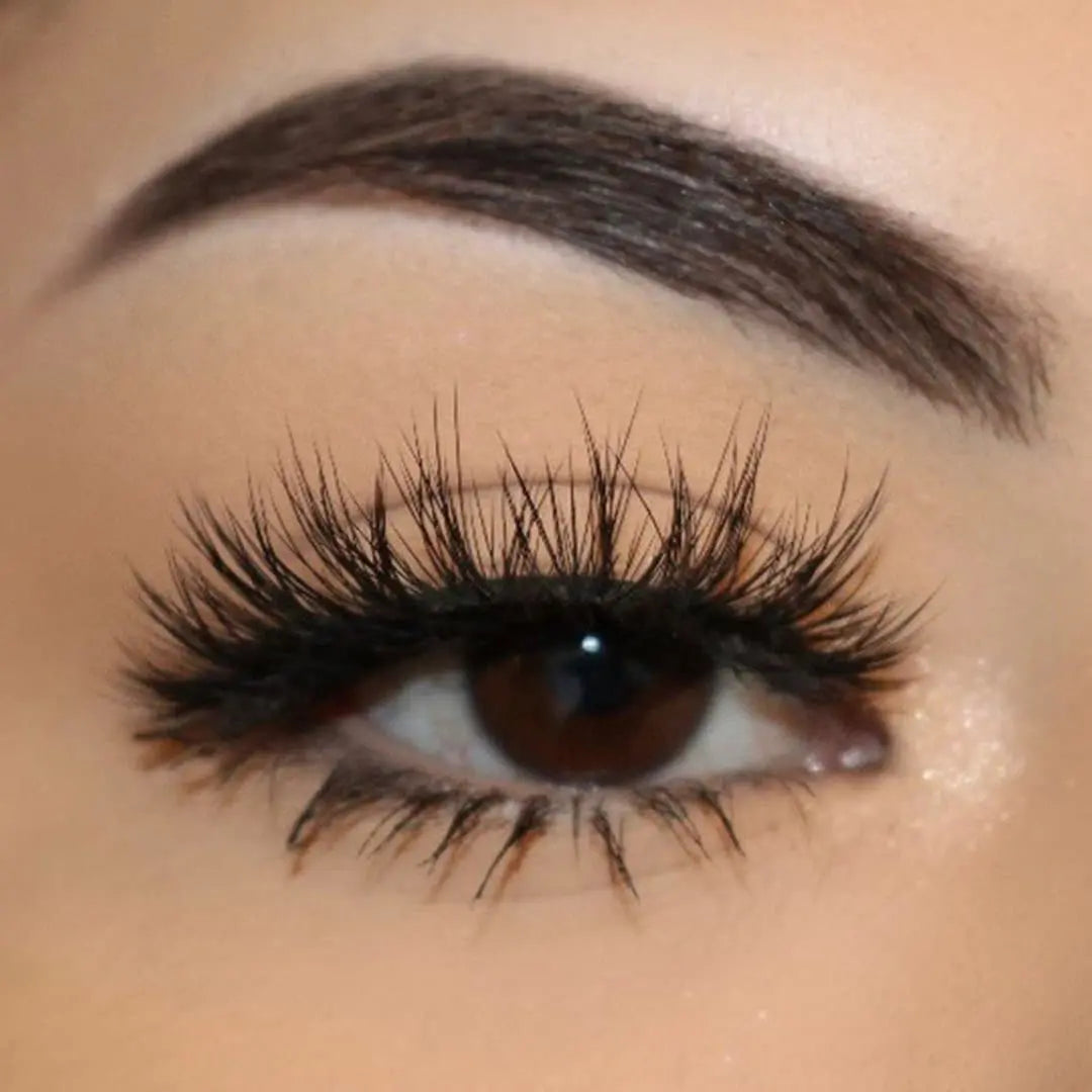 Close-up of an eye wearing Whisp It wispy strip lashes