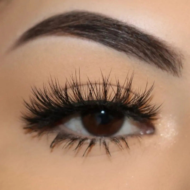 Close-up of an eye wearing Whisp It wispy strip lashes