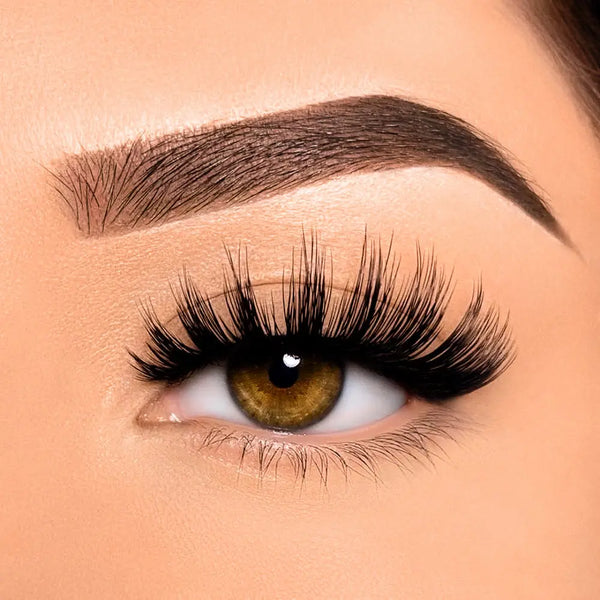 Close-up of an eye wearing Ambitious short spiky volume strip lashes by Wyld Chics